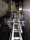 Used Serac Model R12D6 V6/720 Net Weight Monoblock Rotary Liquid Filler