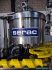 Used Serac Model R12D6 V6/720 Net Weight Monoblock Rotary Liquid Filler