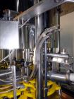 Used Serac Model R12D6 V6/720 Net Weight Monoblock Rotary Liquid Filler