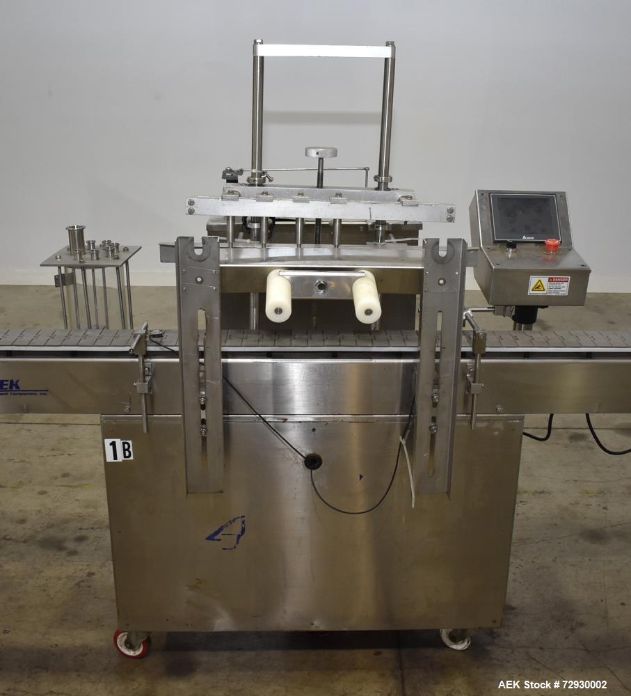 Used- Accutek AccuVac Series 4-Head Automatic Vacuum Filler. 4-Diving nozzles. Production speed up to 60 CPM. Approximate fi...