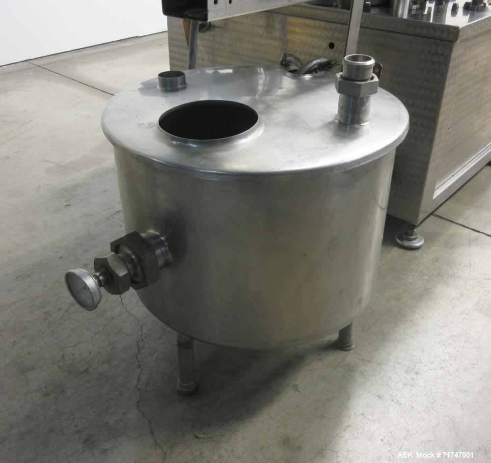 Used GAI Model 6200 16-Head Rotary Vacuum Filler