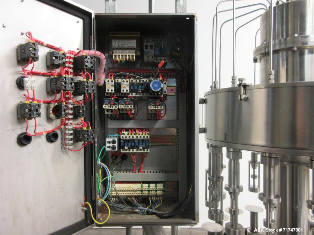 Used GAI Model 6200 16-Head Rotary Vacuum Filler