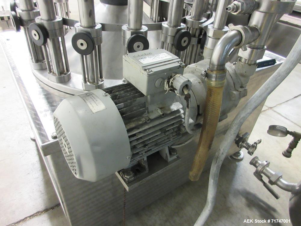Used GAI Model 6200 16-Head Rotary Vacuum Filler
