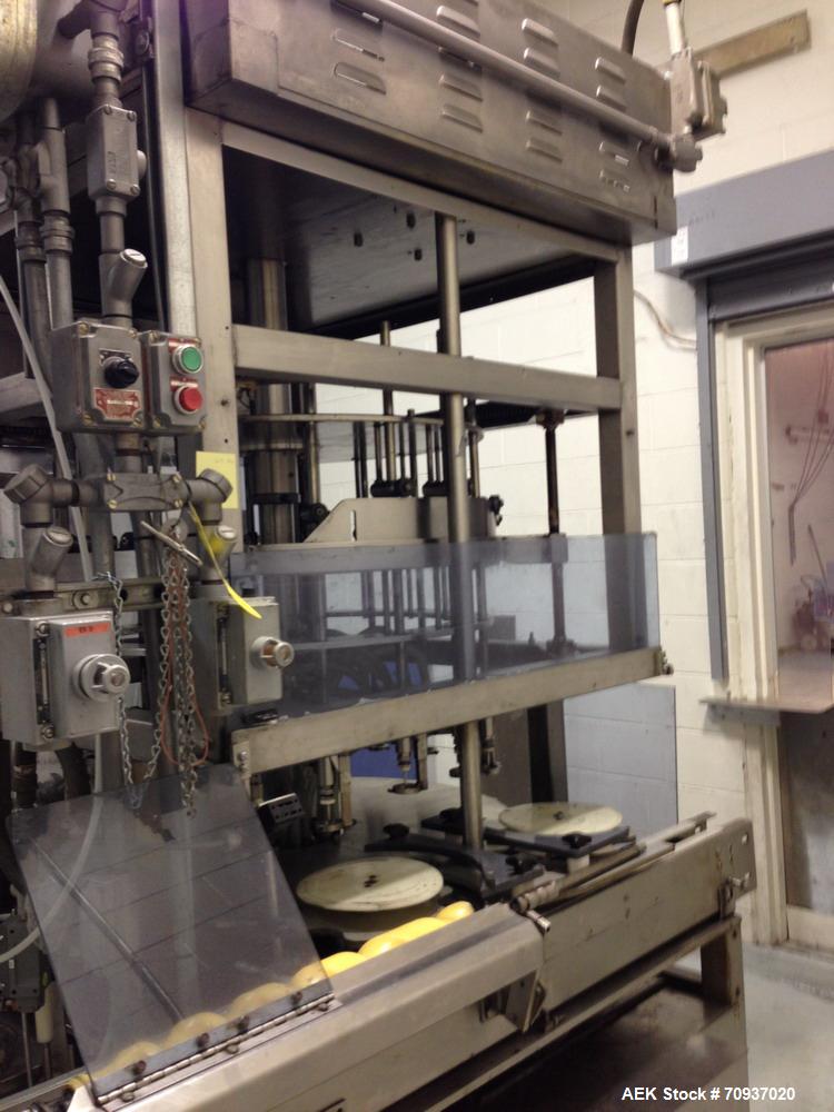 Used JG Machine 18 Head Rotary Vacuum Pocket Filler. Production rates up to 80 cpm(depending on size and material filled). Has stainless steel supply tank, explosion proof, vacuum jar, stainless stee...