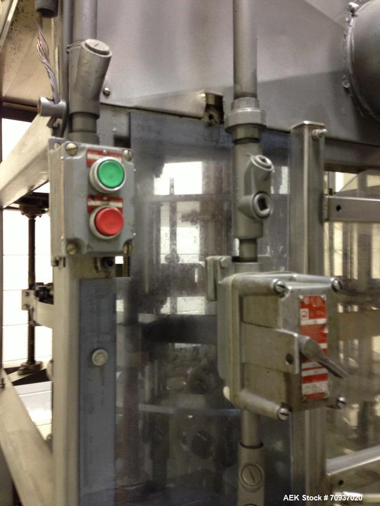 Used JG Machine 18 Head Rotary Vacuum Pocket Filler. Production rates up to 80 cpm(depending on size and material filled). Has stainless steel supply tank, explosion proof, vacuum jar, stainless stee...