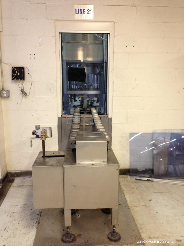 Used JG Machine 12 Head Rotary Vacuum Pocket Filler. Production rates up to 80 cpm(depending on size and material filled). Has stainless steel supply tank, explosion proof, vacuum jar, stainless stee...