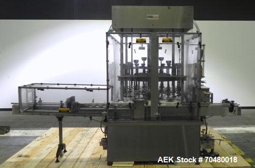 Used MRM Elgin 24 Head Rotary Gravity Overflow Filler. Capable of speeds up to 130 containers per minute. Machine is set on 6" centers with centering belts and 3/16" diameter nozzles. Screw conveyor ...