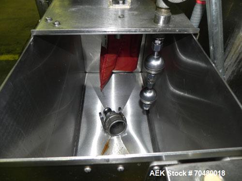 Used MRM Elgin 24 Head Rotary Gravity Overflow Filler. Capable of speeds up to 130 containers per minute. Machine is set on 6" centers with centering belts and 3/16" diameter nozzles. Screw conveyor ...