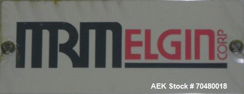 Used MRM Elgin 24 Head Rotary Gravity Overflow Filler. Capable of speeds up to 130 containers per minute. Machine is set on 6" centers with centering belts and 3/16" diameter nozzles. Screw conveyor ...