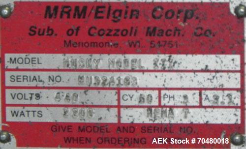 Used MRM Elgin 24 Head Rotary Gravity Overflow Filler. Capable of speeds up to 130 containers per minute. Machine is set on 6" centers with centering belts and 3/16" diameter nozzles. Screw conveyor ...