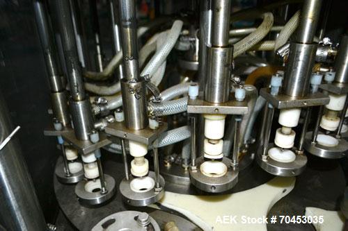 Used MRM/Elgin 18 Head Rotary Vacuum Filler