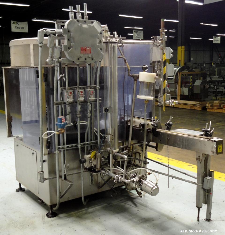 Used- US Bottlers Model VA-28 Rotary Vacuum Liquid Filler