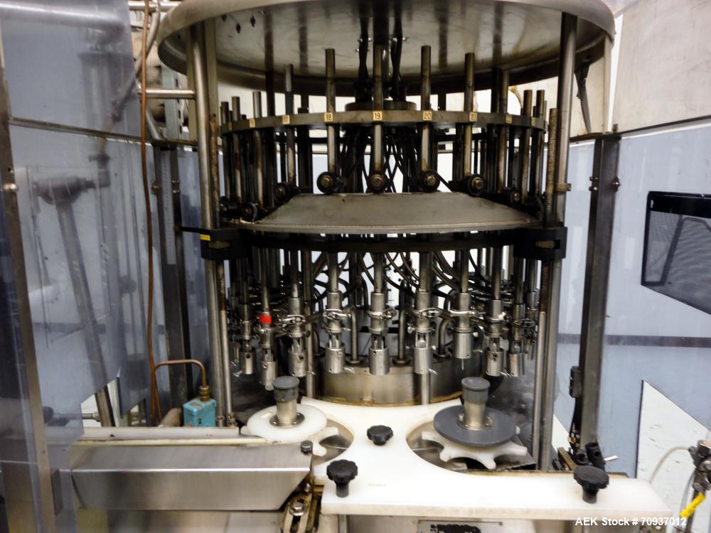 Used US Bottlers Model VA-28 Rotary Vacuum Liquid Filler