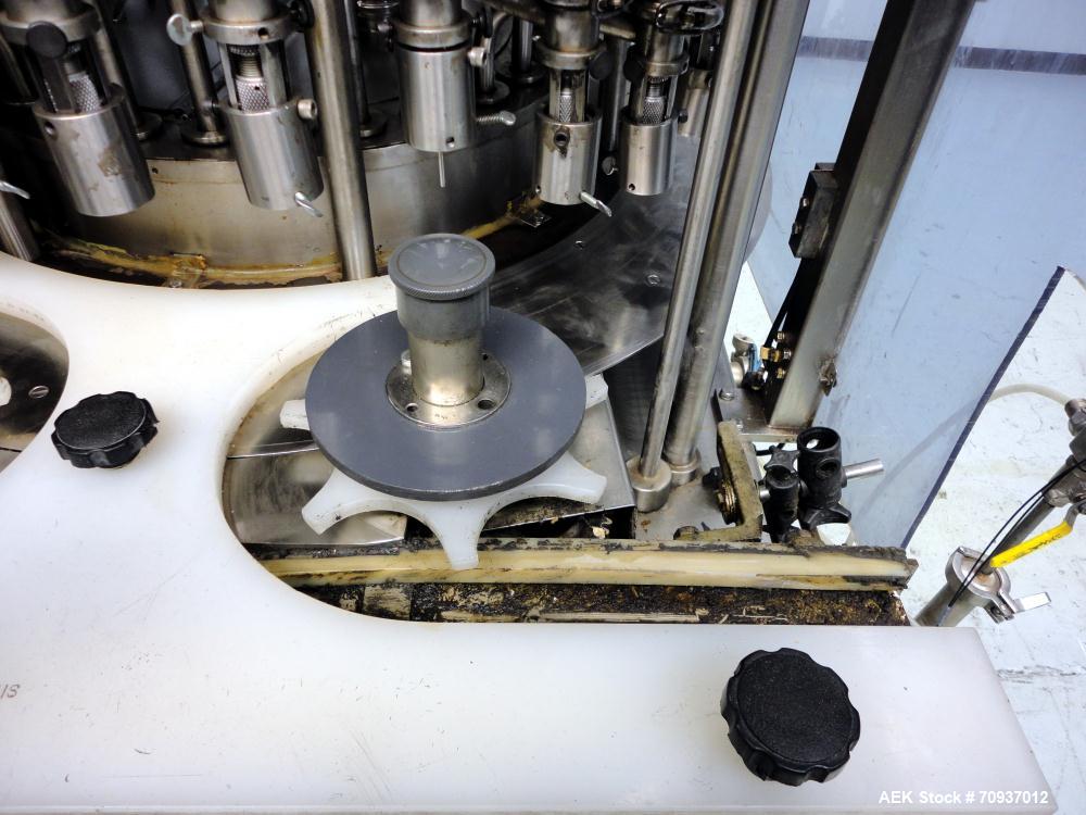 Used US Bottlers Model VA-28 Rotary Vacuum Liquid Filler
