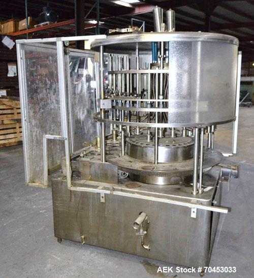 Used US Bottlers VA-32 Rotary Vacuum Filler chassis, not equipped with nozzles or change parts. SELLING PRICE AS IS, WHERE IS, SANFORD, NC.