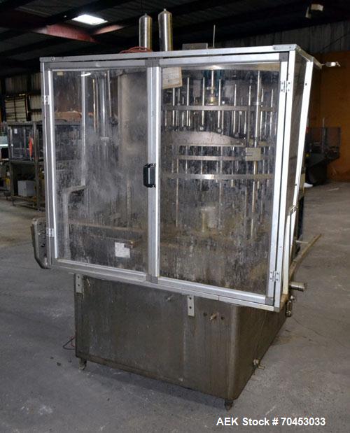 Used US Bottlers VA-32 Rotary Vacuum Filler chassis, not equipped with nozzles or change parts. SELLING PRICE AS IS, WHERE IS, SANFORD, NC.
