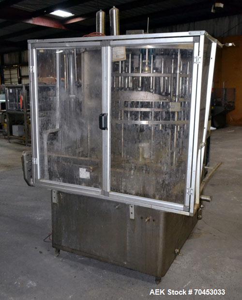 Used- US Bottlers VA-32 Rotary Vacuum Filler chassis, not equipped with nozzles or change parts. SELLING PRICE AS IS, WHERE ...