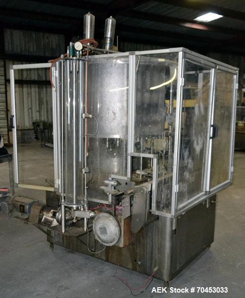 Used US Bottlers VA-32 Rotary Vacuum Filler chassis, not equipped with nozzles or change parts. SELLING PRICE AS IS, WHERE IS, SANFORD, NC.
