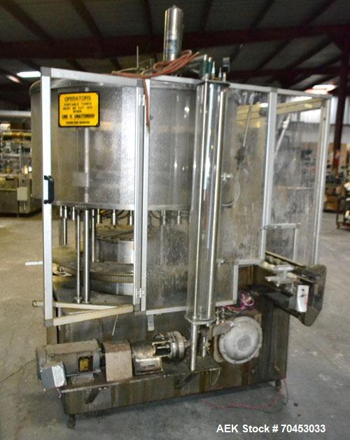 Used US Bottlers VA-32 Rotary Vacuum Filler chassis, not equipped with nozzles or change parts. SELLING PRICE AS IS, WHERE IS, SANFORD, NC.