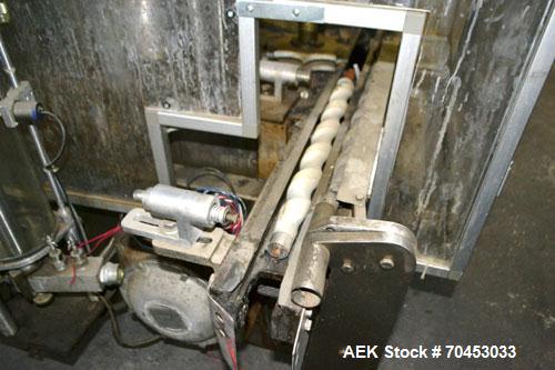 Used US Bottlers VA-32 Rotary Vacuum Filler chassis, not equipped with nozzles or change parts. SELLING PRICE AS IS, WHERE IS, SANFORD, NC.