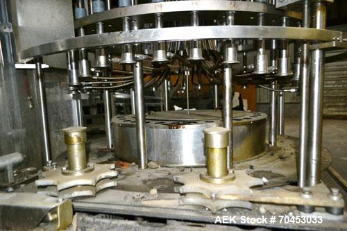 Used US Bottlers VA-32 Rotary Vacuum Filler chassis, not equipped with nozzles or change parts. SELLING PRICE AS IS, WHERE IS, SANFORD, NC.