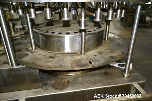 Used US Bottlers VA-32 Rotary Vacuum Filler chassis, not equipped with nozzles or change parts. SELLING PRICE AS IS, WHERE IS, SANFORD, NC.