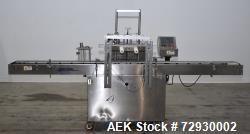 Used- Accutek AccuVac Series 4-Head Automatic Vacuum Filler. 4-Diving nozzles. Production speed up to 60 CPM. Approximate fi...