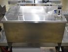 Used- Accutek AccuVac Series 4-Head Automatic Vacuum Filler. 4-Diving nozzles. Production speed up to 60 CPM. Approximate fi...