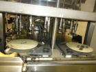 Used JG Machine 18 Head Rotary Vacuum Pocket Filler. Production rates up to 80 cpm(depending on size and material filled). Has stainless steel supply tank, explosion proof, vacuum jar, stainless stee...