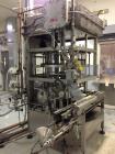 Used JG Machine 18 Head Rotary Vacuum Pocket Filler. Production rates up to 80 cpm(depending on size and material filled). Has stainless steel supply tank, explosion proof, vacuum jar, stainless stee...