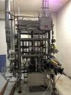 Used JG Machine 18 Head Rotary Vacuum Pocket Filler. Production rates up to 80 cpm(depending on size and material filled). Has stainless steel supply tank, explosion proof, vacuum jar, stainless stee...