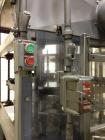Used JG Machine 18 Head Rotary Vacuum Pocket Filler. Production rates up to 80 cpm(depending on size and material filled). Has stainless steel supply tank, explosion proof, vacuum jar, stainless stee...