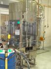 Used JG Machine 12 Head Rotary Vacuum Pocket Filler. Production rates up to 80 cpm(depending on size and material filled). Has stainless steel supply tank, explosion proof, vacuum jar, stainless stee...
