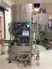 Used JG Machine 12 Head Rotary Vacuum Pocket Filler. Production rates up to 80 cpm(depending on size and material filled). Has stainless steel supply tank, explosion proof, vacuum jar, stainless stee...