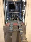 Used JG Machine 12 Head Rotary Vacuum Pocket Filler. Production rates up to 80 cpm(depending on size and material filled). Has stainless steel supply tank, explosion proof, vacuum jar, stainless stee...