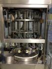 Used JG Machine 12 Head Rotary Vacuum Pocket Filler. Production rates up to 80 cpm(depending on size and material filled). Has stainless steel supply tank, explosion proof, vacuum jar, stainless stee...