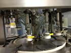 Used JG Machine 12 Head Rotary Vacuum Pocket Filler. Production rates up to 80 cpm(depending on size and material filled). Has stainless steel supply tank, explosion proof, vacuum jar, stainless stee...