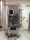 Used JG Machine 12 Head Rotary Vacuum Pocket Filler. Production rates up to 80 cpm(depending on size and material filled). Has stainless steel supply tank, explosion proof, vacuum jar, stainless stee...