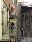Used JG Machine 12 Head Rotary Vacuum Pocket Filler. Production rates up to 80 cpm(depending on size and material filled). Has stainless steel supply tank, explosion proof, vacuum jar, stainless stee...