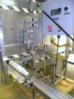 Used- Filling Equipment Company 24 Head Rotary Vacuum Filler