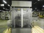 Used MRM Elgin 24 Head Rotary Gravity Overflow Filler. Capable of speeds up to 130 containers per minute. Machine is set on 6