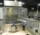 Used MRM Elgin 24 Head Rotary Gravity Overflow Filler. Capable of speeds up to 130 containers per minute. Machine is set on 6