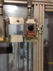 Used MRM 8 Head Rotary Vacuum Filler, speeds up to 100 bottles per minute maximum, vacuum jar, explosion proof design, stainless steel and Lexan guards.

