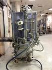 Used MRM 8 Head Rotary Vacuum Filler, speeds up to 100 bottles per minute maximum, vacuum jar, explosion proof design, stainless steel and Lexan guards.

