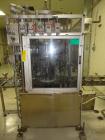Used RJM 12 Head Rotary Vacuum Filler, explosion proof, vacuum jar, stainless steel and lexan guards, stainless steel supply tank. Pocket filler design (no container handling parts).