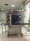 Used RJM 12 Head Rotary Vacuum Filler, explosion proof, vacuum jar, stainless steel and lexan guards, stainless steel supply tank. Pocket filler design (no container handling parts).