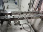 Used RJM 12 Head Rotary Vacuum Filler, explosion proof, vacuum jar, stainless steel and lexan guards, stainless steel supply tank. Pocket filler design (no container handling parts).