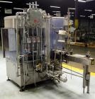Used US Bottlers Model VA-28 Rotary Vacuum Liquid Filler