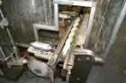 Used- US Bottlers VA-32 Rotary Vacuum Filler chassis, not equipped with nozzles or change parts. SELLING PRICE AS IS, WHERE ...