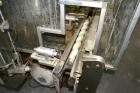 Used US Bottlers VA-32 Rotary Vacuum Filler chassis, not equipped with nozzles or change parts. SELLING PRICE AS IS, WHERE IS, SANFORD, NC.